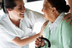 retired woman with her nurse