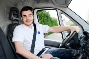 man driving an ambulance paramedic transportation